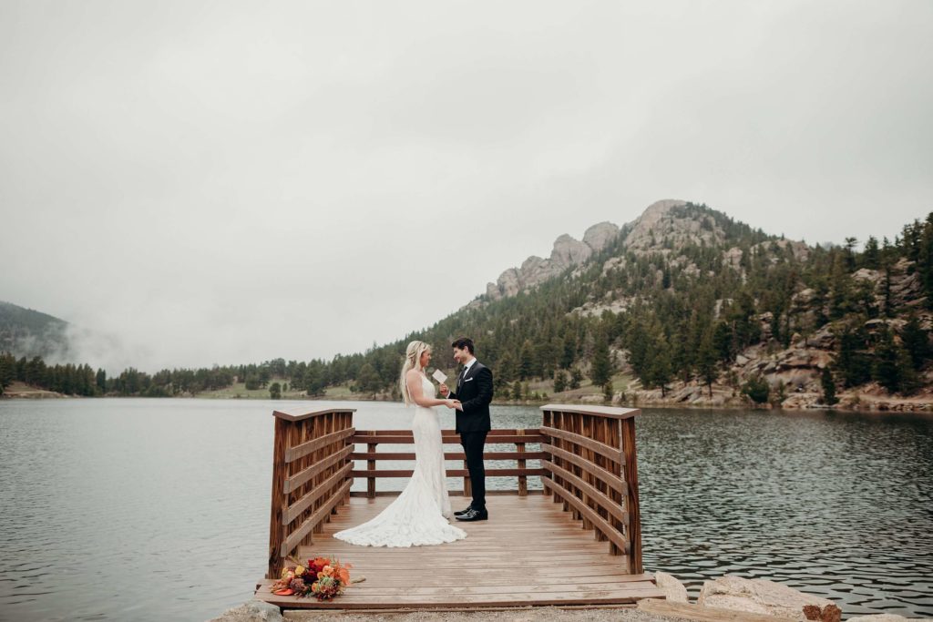 Rocky Mountain National Park Wedding, Couple at Lily Lake, Elopement couple at Lily Lake, Rainy day at rocky mountain national park, rocky mountain national park wedding guide, how to elope at rocky mountain national park