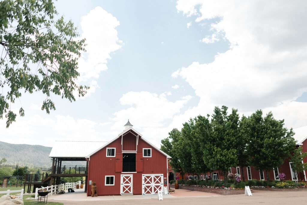 The Venue at Crooked Willow Farms Wedding, summer wedding crooked willow farms, candid wedding photography, barn wedding venues Colorado, modern barn weddings, tour of crooked willow farms, crooked willow farms wedding pricing, wedding cape inspiration, rust color bridesmaid dresses, orange and terracotta wedding colors, unique tablescapes wedding, starwars tablescape wedding idea, couples photos crooked willows, Leah Goetzel photography, Colorado wedding photographer, Denver wedding photographer