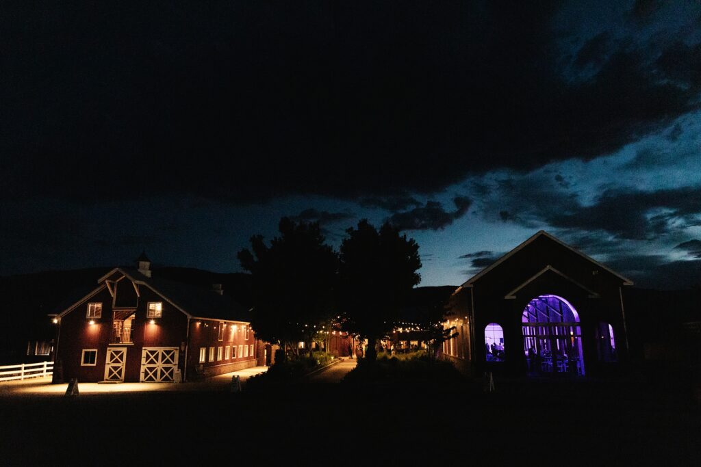 The Venue at Crooked Willow Farms Wedding, summer wedding crooked willow farms, candid wedding photography, barn wedding venues Colorado, modern barn weddings, tour of crooked willow farms, crooked willow farms wedding pricing, wedding cape inspiration, rust color bridesmaid dresses, orange and terracotta wedding colors, unique tablescapes wedding, starwars tablescape wedding idea, couples photos crooked willows, Leah Goetzel photography, Colorado wedding photographer, Denver wedding photographer