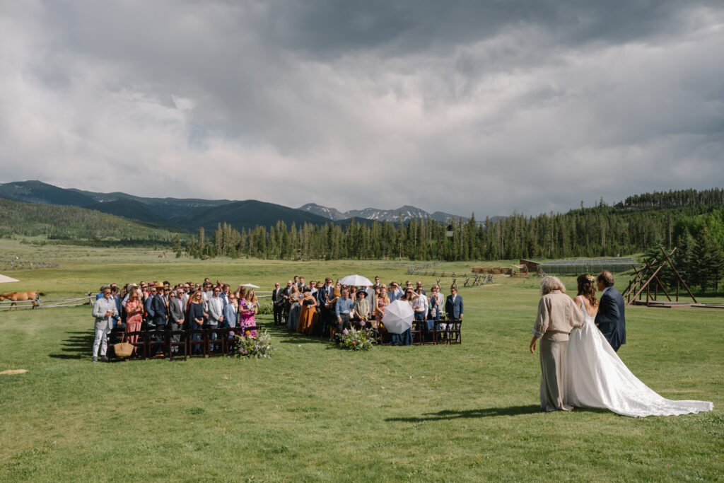 Colorado wedding photographer, Denver wedding photographer, mountain wedding venue near Denver, wedding venue with mountain view, wedding venue with onsite lodging, luxury wedding photographer, candid wedding photographer, Devils Thumb Ranch wedding inspiration, summer wedding in the mountains, barn wedding venue, ranch wedding venue