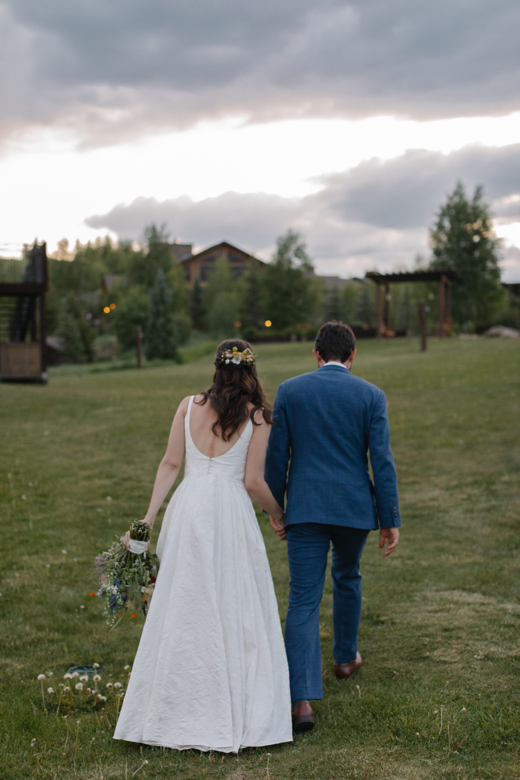 Colorado wedding photographer, Denver wedding photographer, mountain wedding venue near Denver, wedding venue with mountain view, wedding venue with onsite lodging, luxury wedding photographer, candid wedding photographer, Devils Thumb Ranch wedding inspiration, summer wedding in the mountains, barn wedding venue, ranch wedding venue
