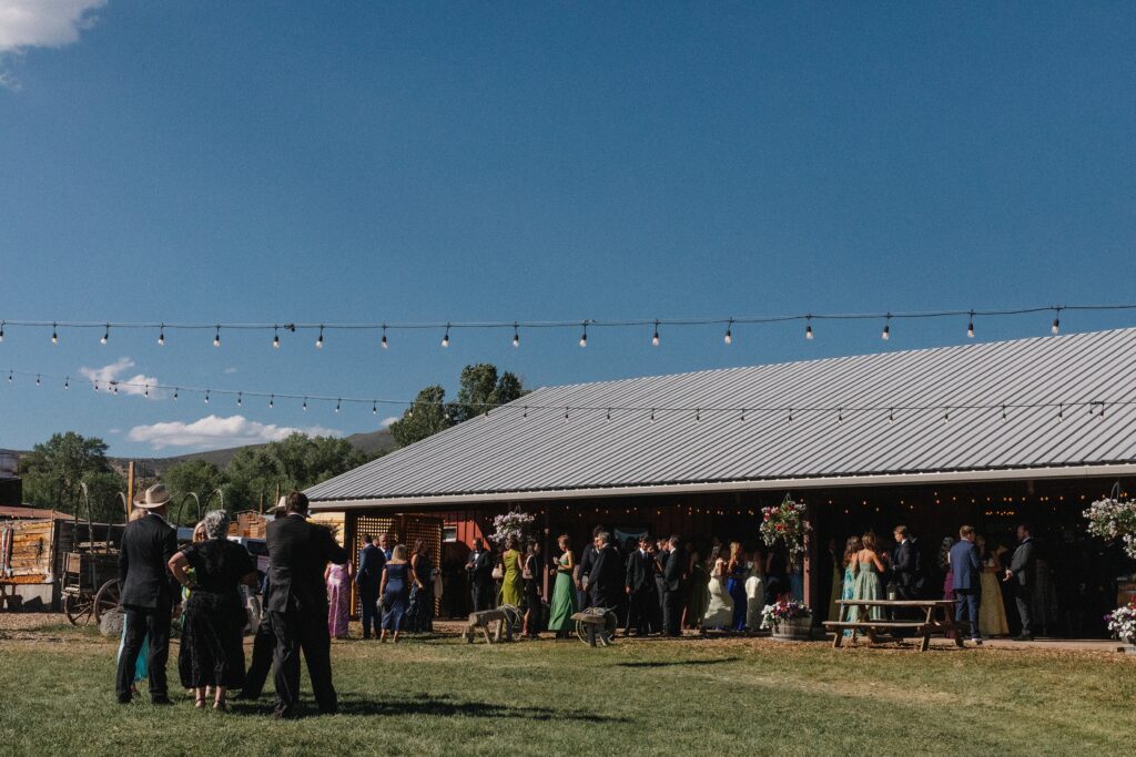 Summer wedding at 4 Eagle Ranch by Colorado wedding photographer, Leah Goetzel Photography, ceremony , cocktail hour